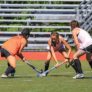 Worcester State Field Hockey Girl Trapping Ball