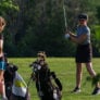 Nike Junior Golf Camp girls tee shot practice png