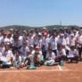 Nike Softball Campers and coaches pose  for group picture at Cal Lutheran