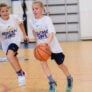 2 girls playing scrimmage