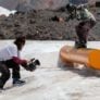 High Cascade Snowboard Camp coach films camper learning tube jpg