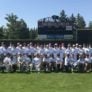 Nike Baseball Campers and coaches pose in outfield of Merkel Field for group picture