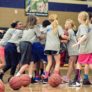 Girls Team Huddle at the nike basketball camp