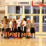 WJU girls nike basketball camp team huddle at the summer youth basketball camp
