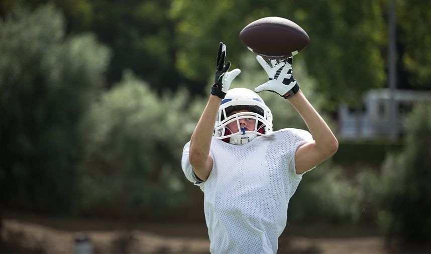 Football Receiving Tip Althete Catching Ball