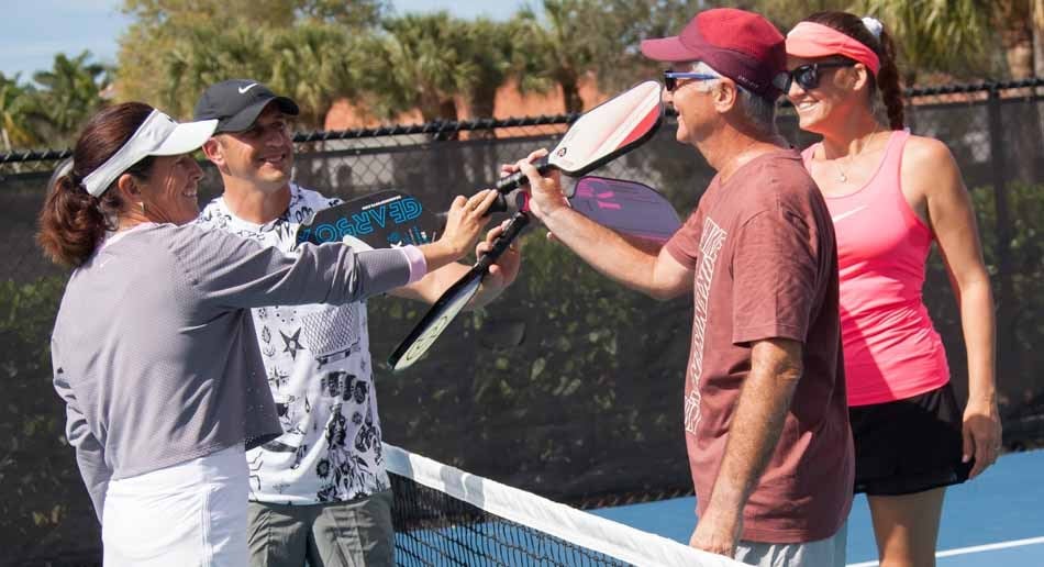 Photoshoot 2 pickleball group paddles in