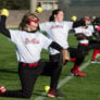 Line of Nike Softball Campers all throwing