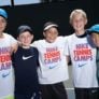 Tennis boys group smiling
