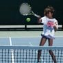 Tennis girl forehand at net