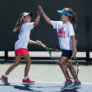 Tennis girls high five