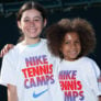 Tennis grils smiling